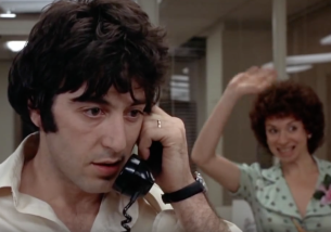 Miriam waving to the cameras in Dog Day Afternoon